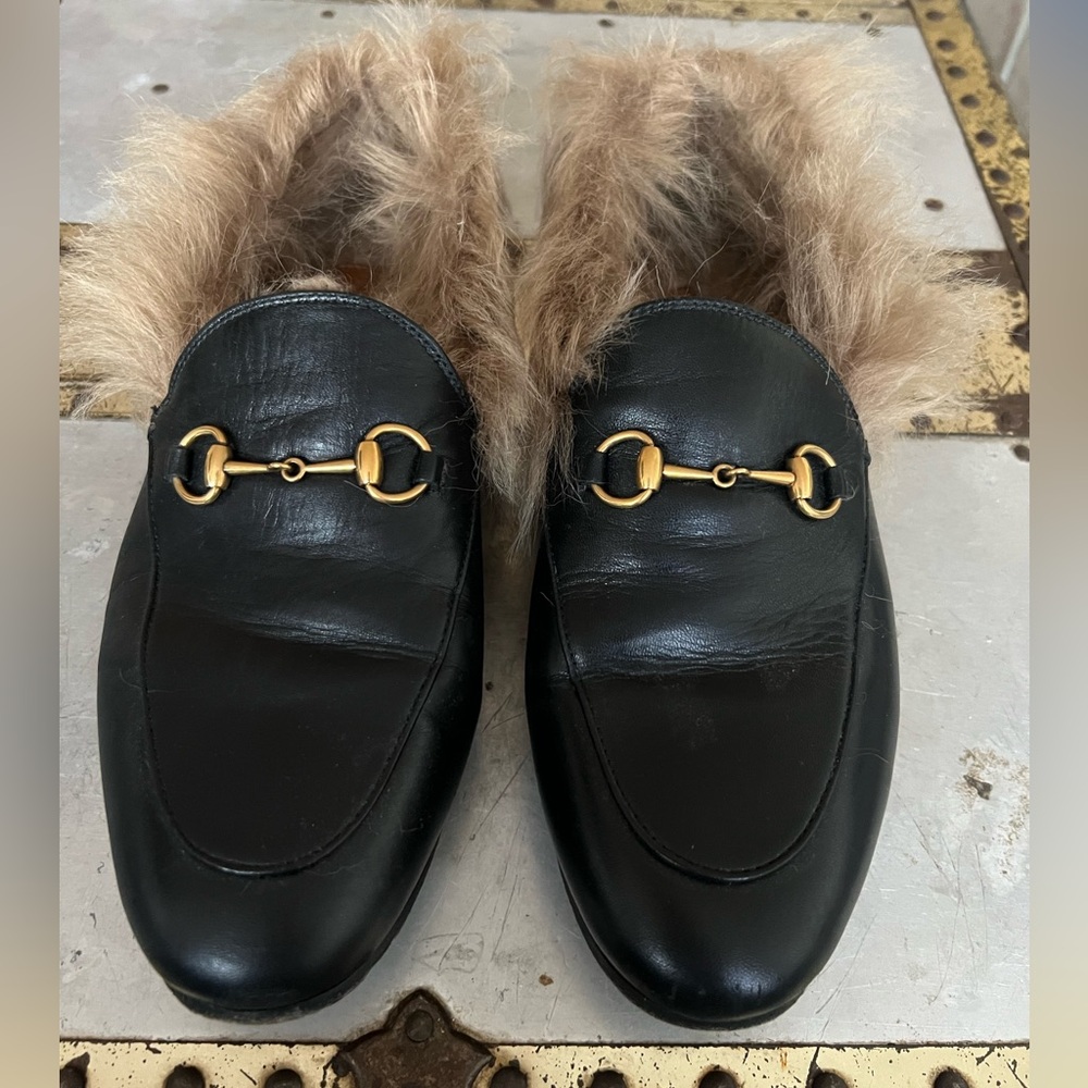 Authentic Gucci black fur lined loafers